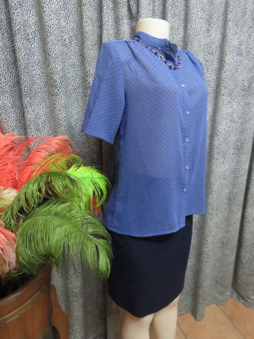 Cobalt blue short sleeve blouse with tiny black dots.Size 36/12 with chinese collar.New item.