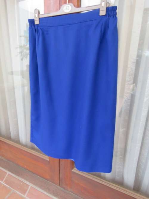 Royal blue pencil skirt by 'MARCHESA' in size 46/22.Zip and slit at back.Good condition.