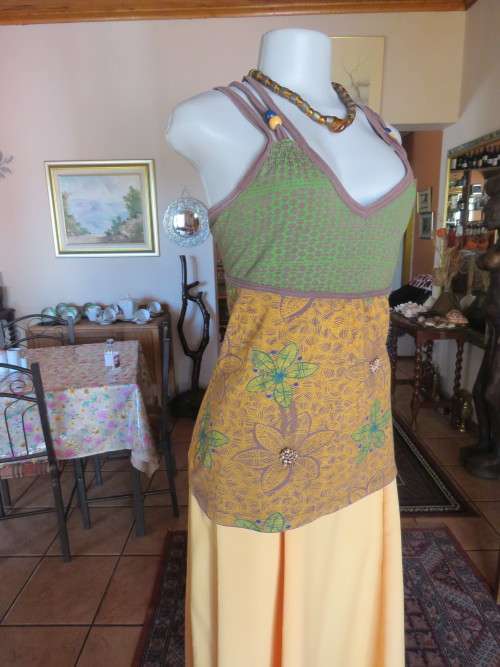 Beautiful strappy top in 100% cotton.By 'CANDY ROCKET'.Made in India.Size 36/12.Used but good cond.