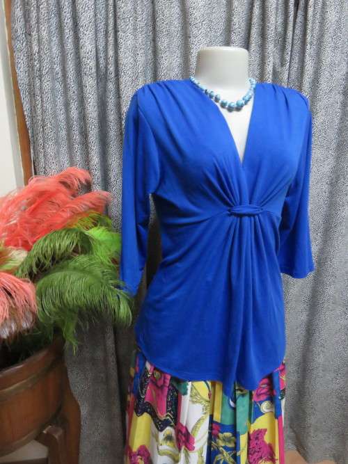Comfy royal blue top with endless mix and match options.By 'CHARCOAL' in size 36/12.As new.
