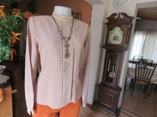 Fabulous dark beige vintage blouse in slip over style with opening at back.Size 34/10.Good condition
