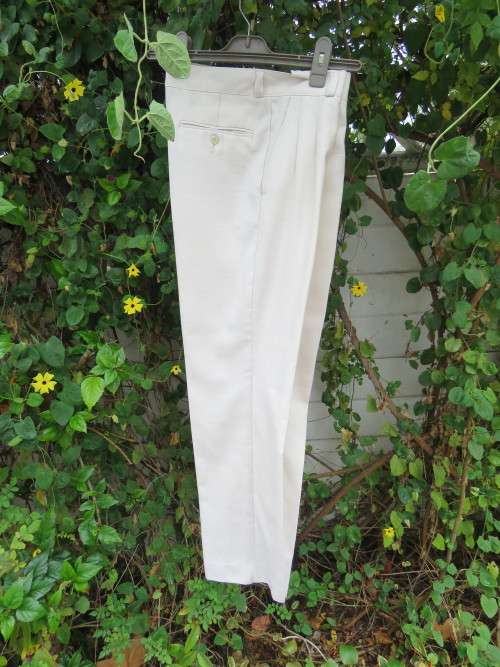 Men's long sleeve trousers in a cream polyester blend.By 'RIDING HIGH' in size 30.As new.