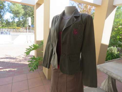 Khaki green long sleeve casual jacket by 'LEGIT' in size 34/10.In 100% heavy cotton.Good condition.