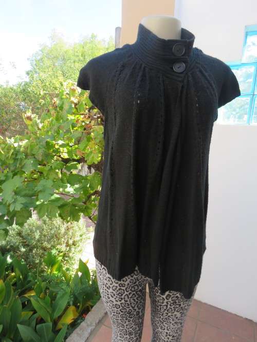 Soft black 100% acrylic knit open hanging capped sleeve top.Size 34/10  `TRUWORTHS`.Good condition.