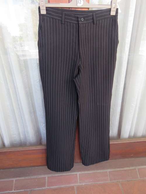Black/white pinstripe long pants for by of 13-14 yr old(size 30).By 'WOOLWORTHS'.New condition.
