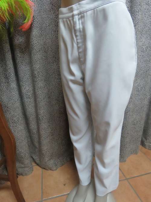 Stylish pale blue pants by 'NEW ERA'.Size 38/14 in polyester stretch fabric.As new.