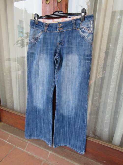 Fashionable blue jeans from 'LEGIT' in size 38/14.In polycotton fabric.Good condition.
