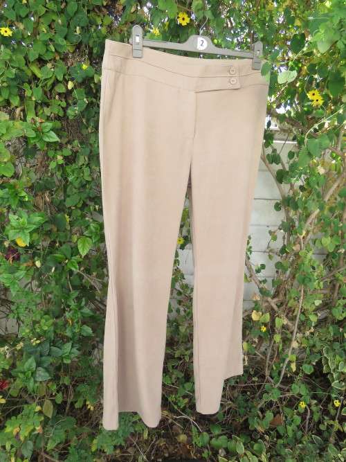 Amazing rich cream pants in size 40/16 by 'INSYNC'.In polyester stretch.Bootlegged.New condition.