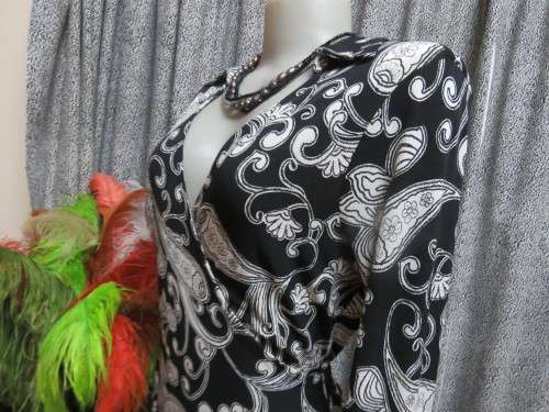 Amazing monochrome dress patterned in paisley design.Size 35/11  by 'RUBBER DUCHY'.New condition.