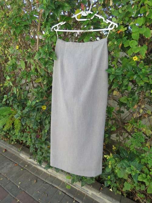 Ankle length fully lined elegant pencil skirt.Size 30/6.Dark beige mottled polyester fabric.As new.