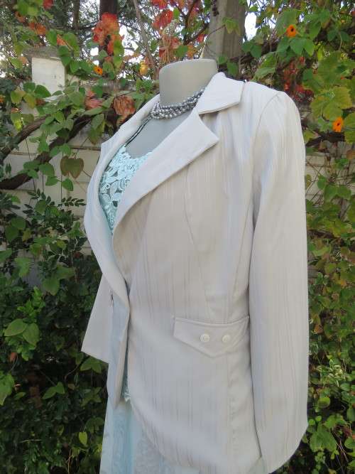 Tailored fully lined jacket in very light grey.Size 34/10  by `JUDY`S PRIDE`.As new.