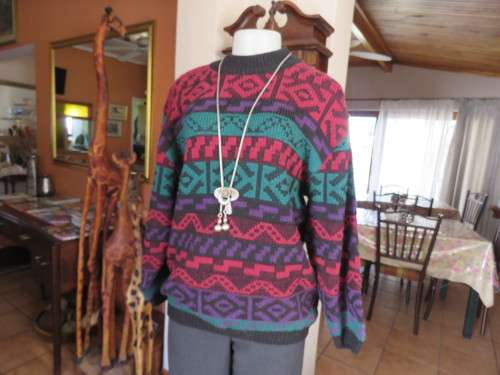 Whimsical fair isle pull over cardigan by 'WOOLWORTHS' in size 34-36.In acrylic knit.As new.