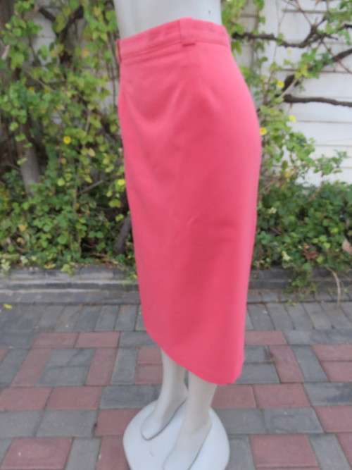 High quality coral colour pencil skirt by `NADA` in size 46/22.In firm polycotton.New condition.