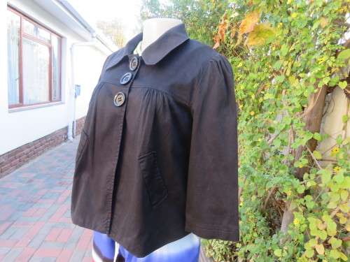 Short fly away black fully lined `KELSO CASUAL` jacket.Size 34/10 in 100% stretch cotton.As new.