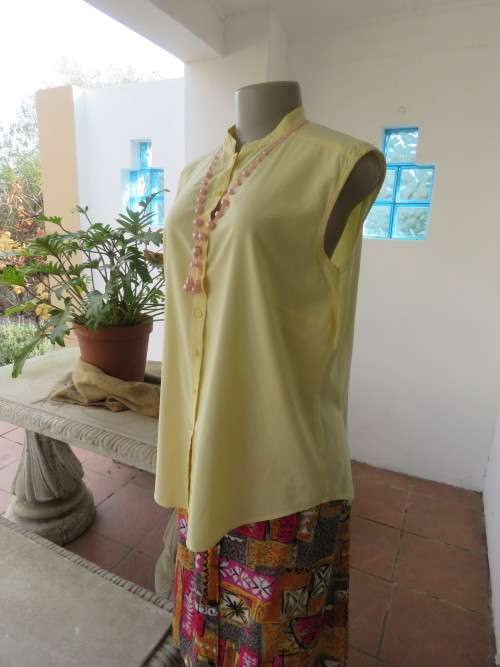 Buttercup yellow sleeveless top by 'WOOLWORTHS' in 38/14.High chinese collar.Good cond.