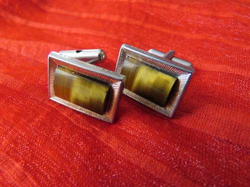 Smart gold toned rectangular cufflinks with tiger eye stone inner.As new.