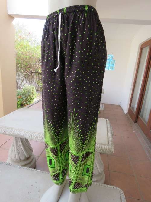 Amazing pants from Thailand in black with neon green dots.Size 36-36 in 100% rayon.New.