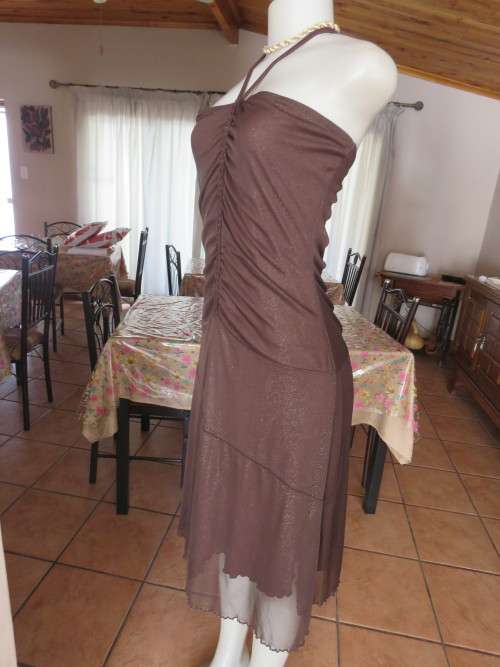 Evening dress in chocolate brown sheer polyester/nylon fabric.By `URB` in 34/10.As new.