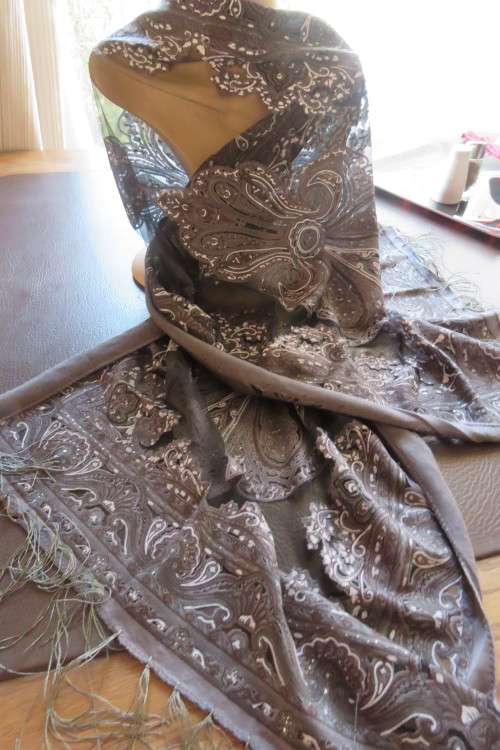 Glamour scarf in see-through black with baroque prints.Size 50 x 160 cm.New item.