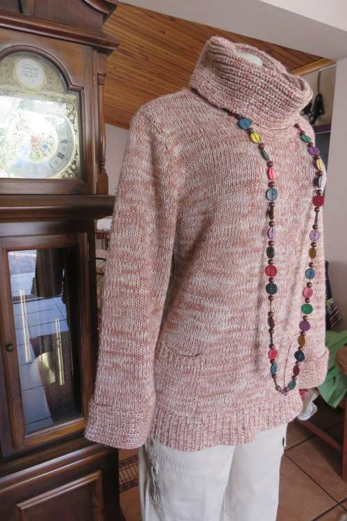 Cosy beige/ecru colour knitted poloneck pullover cardigan by 'AUDACITY' in size 37/13.Good cond.