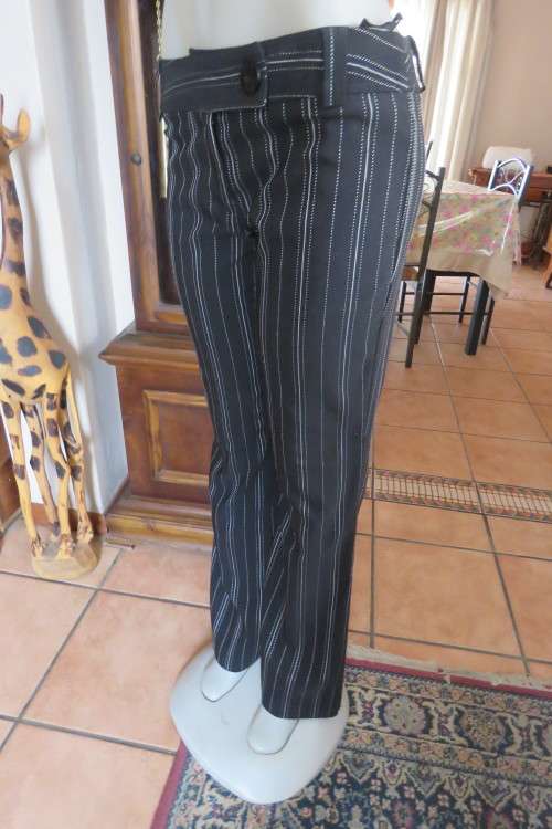 Pinstripe monochrome bootcut med. rise pants by `INWEAR` in size 36/12 with belt loops. As new