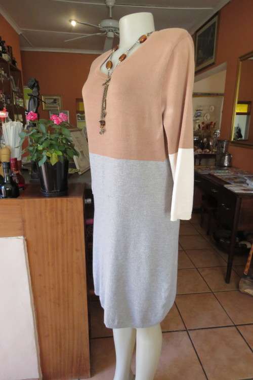 Knitted dress by KELSO in size 40/16 with bracelet length sleeves.In viscose/nylon knit.New cond.