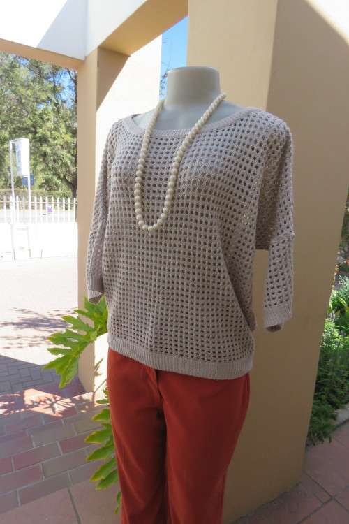 Fabulous knitted top to wear over cami in beige with gold thread.Size 40-42.As new.