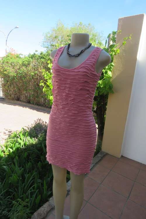 Trendy sleeveless carnation pink bodycon stretch dress covered with frills.  Size 34/10.As new.