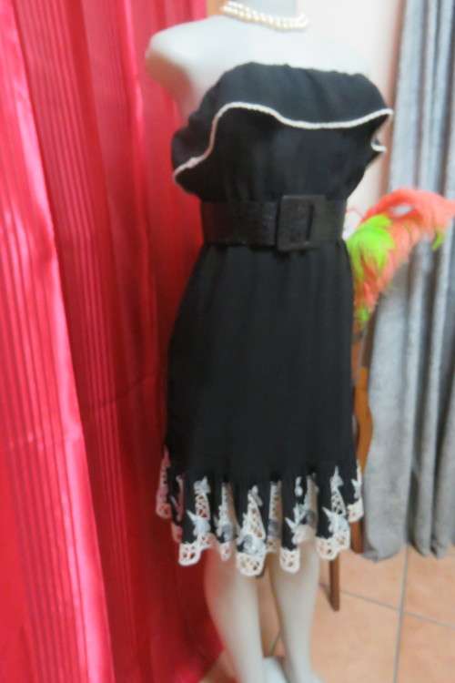 Ultra sexy black strapless dress with Frill on elasticated top. Size 34/10 by `Mozaic`.As new
