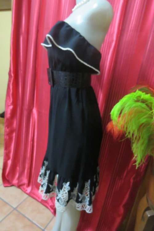 Ultra sexy black strapless dress with Frill on elasticated top. Size 34/10 by `Mozaic`.As new