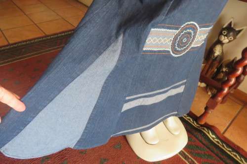Top of the line ankle length trumpet style cotton stretch denim skirt in size 36/12.