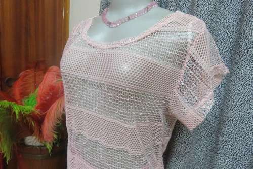 Cute dusty pink mesh type short sleeve top with horizontal lines. Round neckline. Size 36/12.