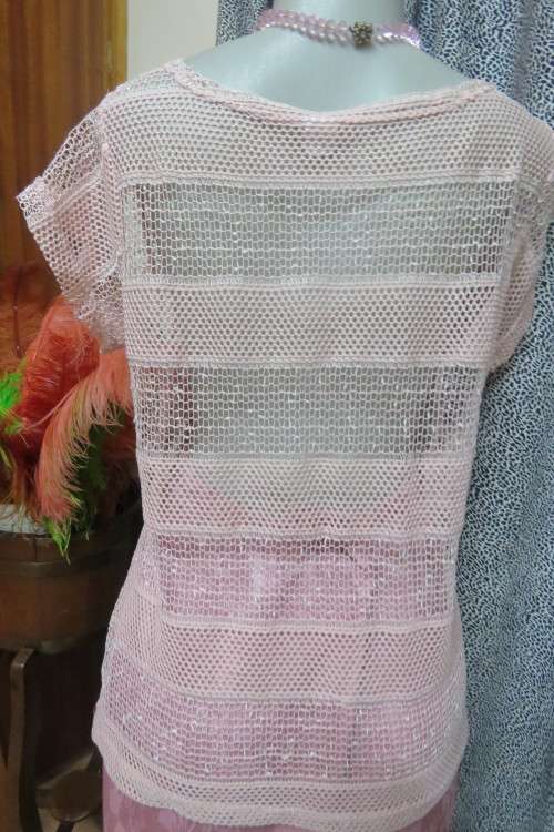 Cute dusty pink mesh type short sleeve top with horizontal lines. Round neckline. Size 36/12.