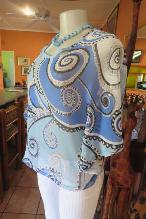 Cool sheer polyester slip over top with rounded seams. By 'Audacity' in size 34/10.