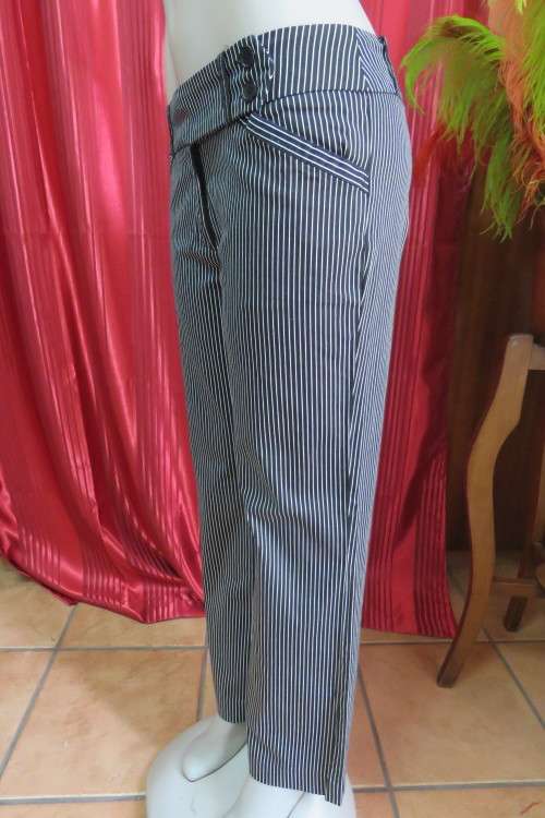 Show stopping low rise black and white striped pants with wide waistband. Size 36/12.