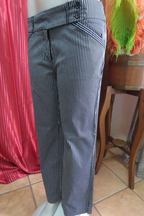 Show stopping low rise black and white striped pants with wide waistband. Size 36/12.