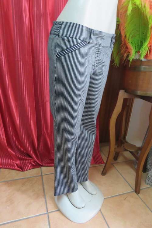 Show stopping low rise black and white striped pants with wide waistband. Size 36/12.