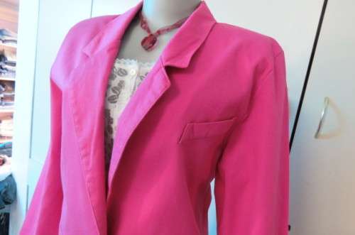 Magenta pink long sleeve jacket in 100% cotton size 36/12. Two large front pockets.