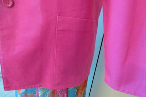 Magenta pink long sleeve jacket in 100% cotton size 36/12. Two large front pockets.
