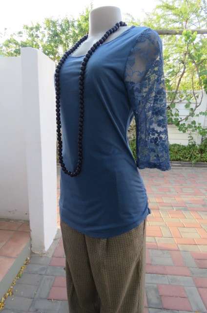 Beautiful steel blue top with scooped neckline. Bracelet length lace sleeves size 34/10 by `Tango`