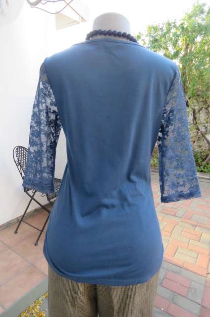 Beautiful steel blue top with scooped neckline. Bracelet length lace sleeves size 34/10 by `Tango`
