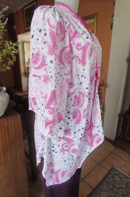Open hanging pale lilac top with violet and dark purple paisley and floral patterns size 42/18.