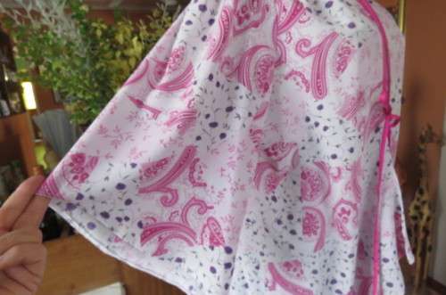 Open hanging pale lilac top with violet and dark purple paisley and floral patterns size 42/18.