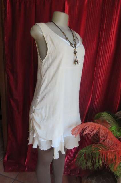 Best quality long cream top with double frilled seam and white underlay, by`Miss Cassidy` size 36/12