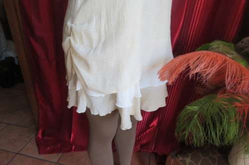 Best quality long cream top with double frilled seam and white underlay, by`Miss Cassidy` size 36/12