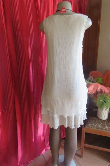 Best quality long cream top with double frilled seam and white underlay, by`Miss Cassidy` size 36/12