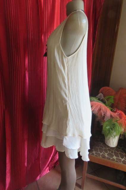 Best quality long cream top with double frilled seam and white underlay, by`Miss Cassidy` size 36/12