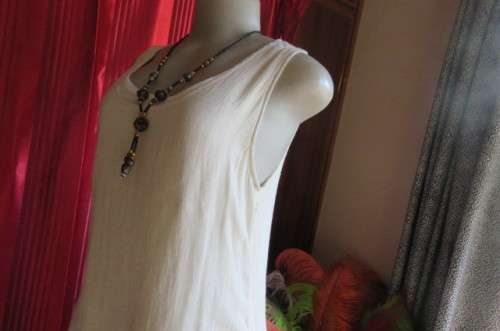 Best quality long cream top with double frilled seam and white underlay, by`Miss Cassidy` size 36/12