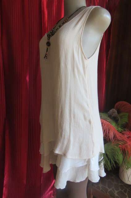 Best quality long cream top with double frilled seam and white underlay, by`Miss Cassidy` size 36/12