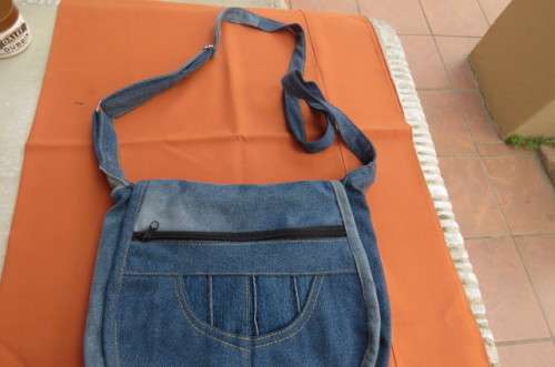 Hand blue denim bag with 3 zipped up departments. Made from used jeans size 30x30 cm.